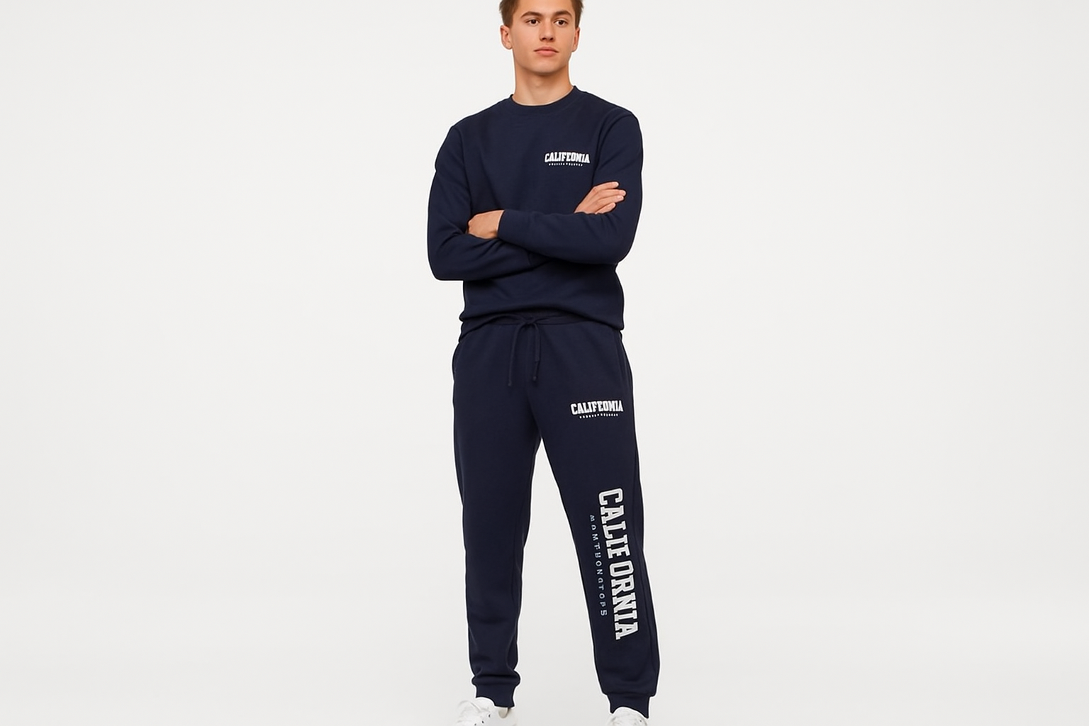 19-year-old in navy California joggers - clean background